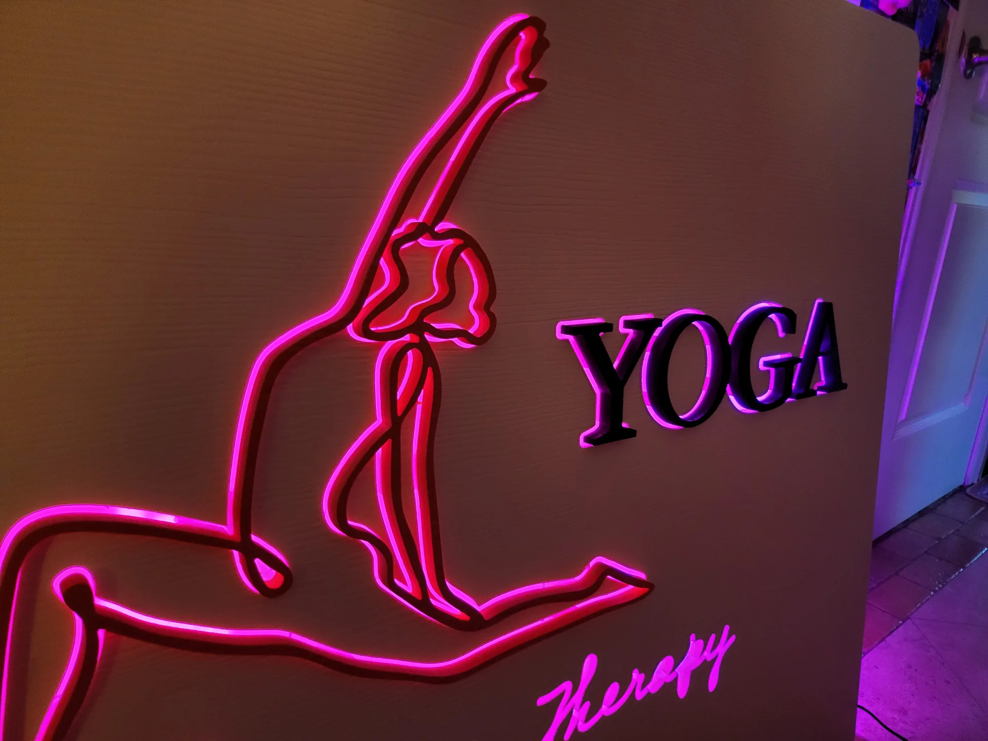 LED neon sign Jola Yoga studio pink
