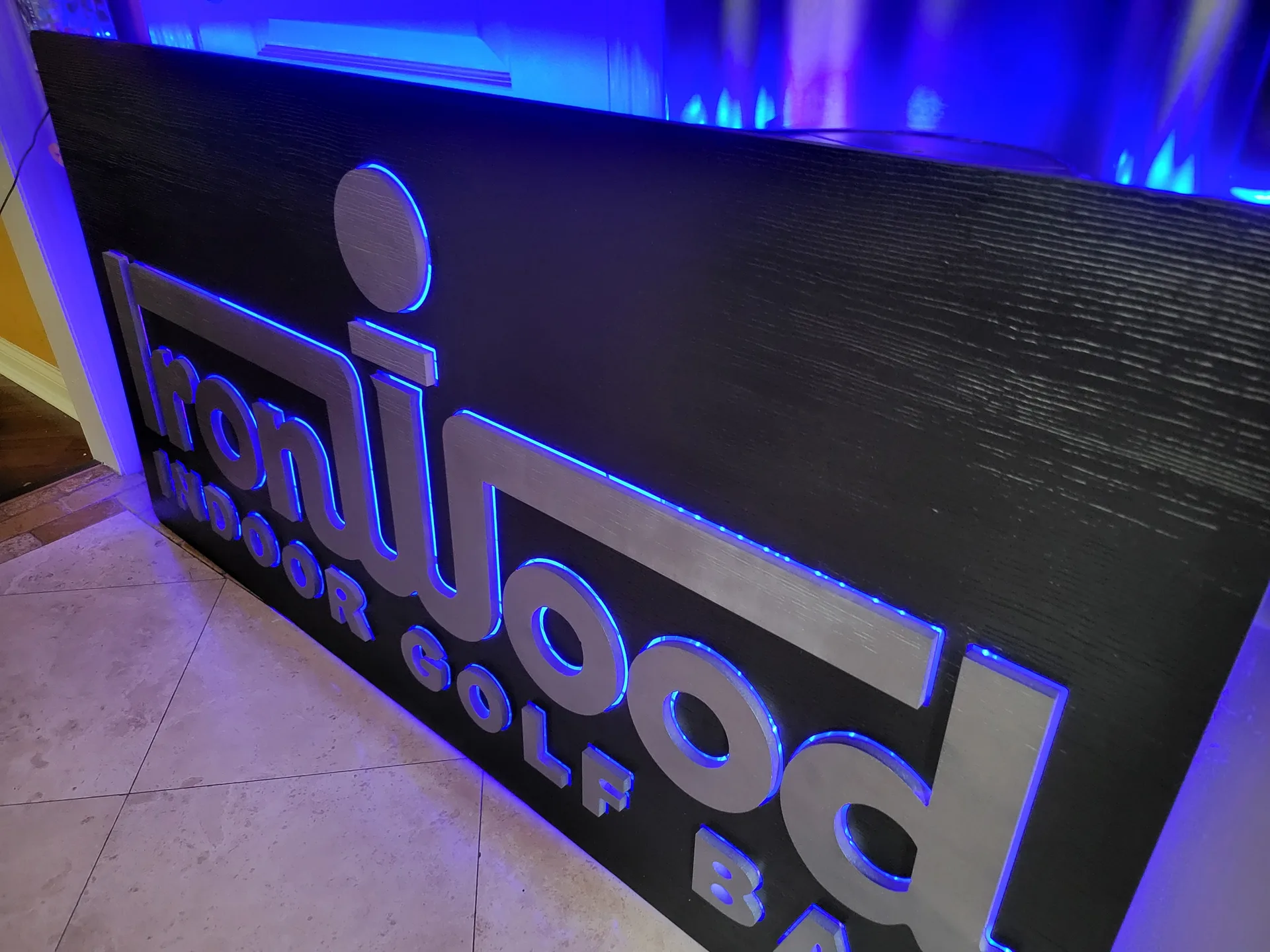 Illuminated business sign for IronWood Indoor Golf Bar