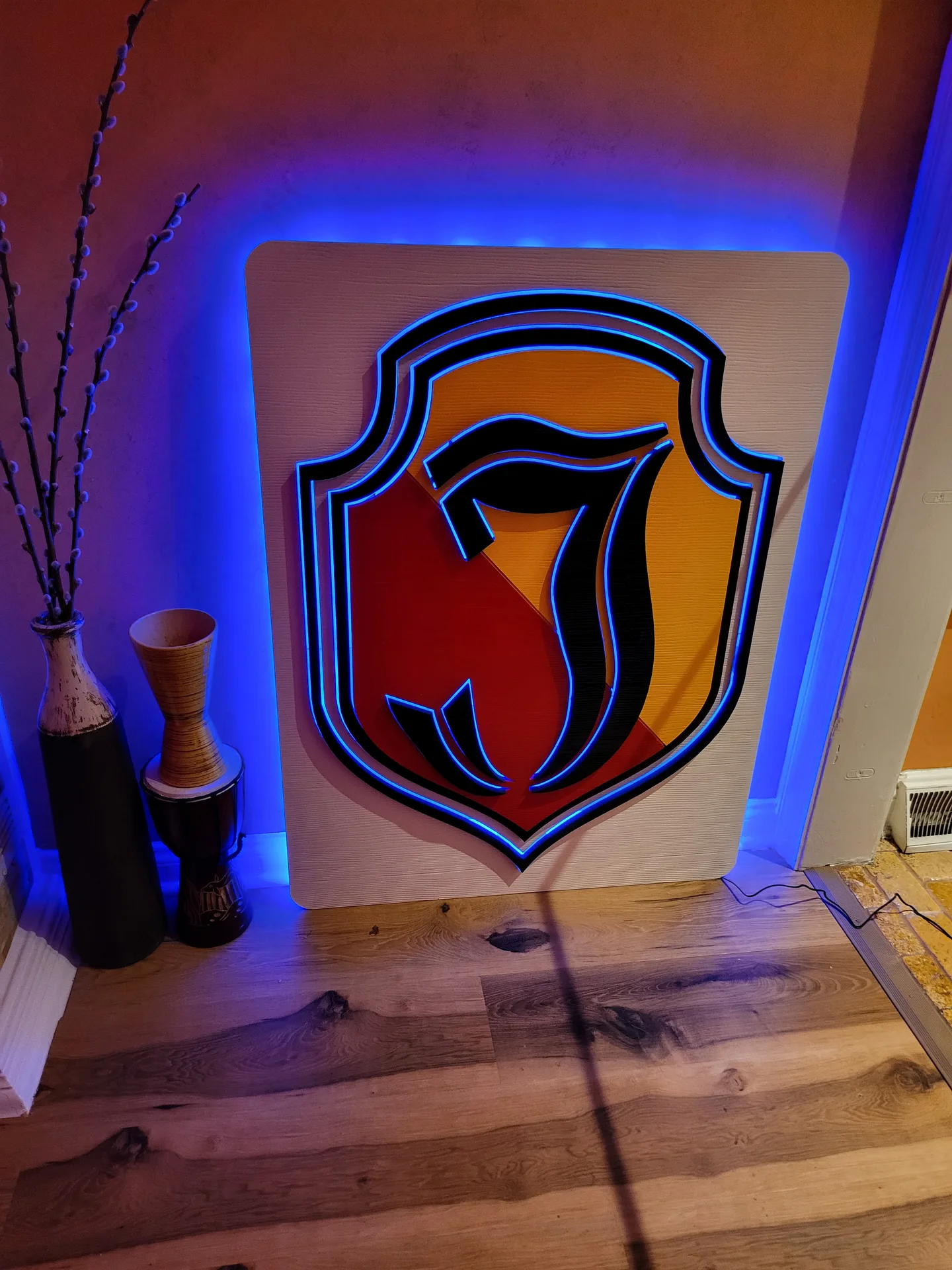 Backlit emblem shield crest blue