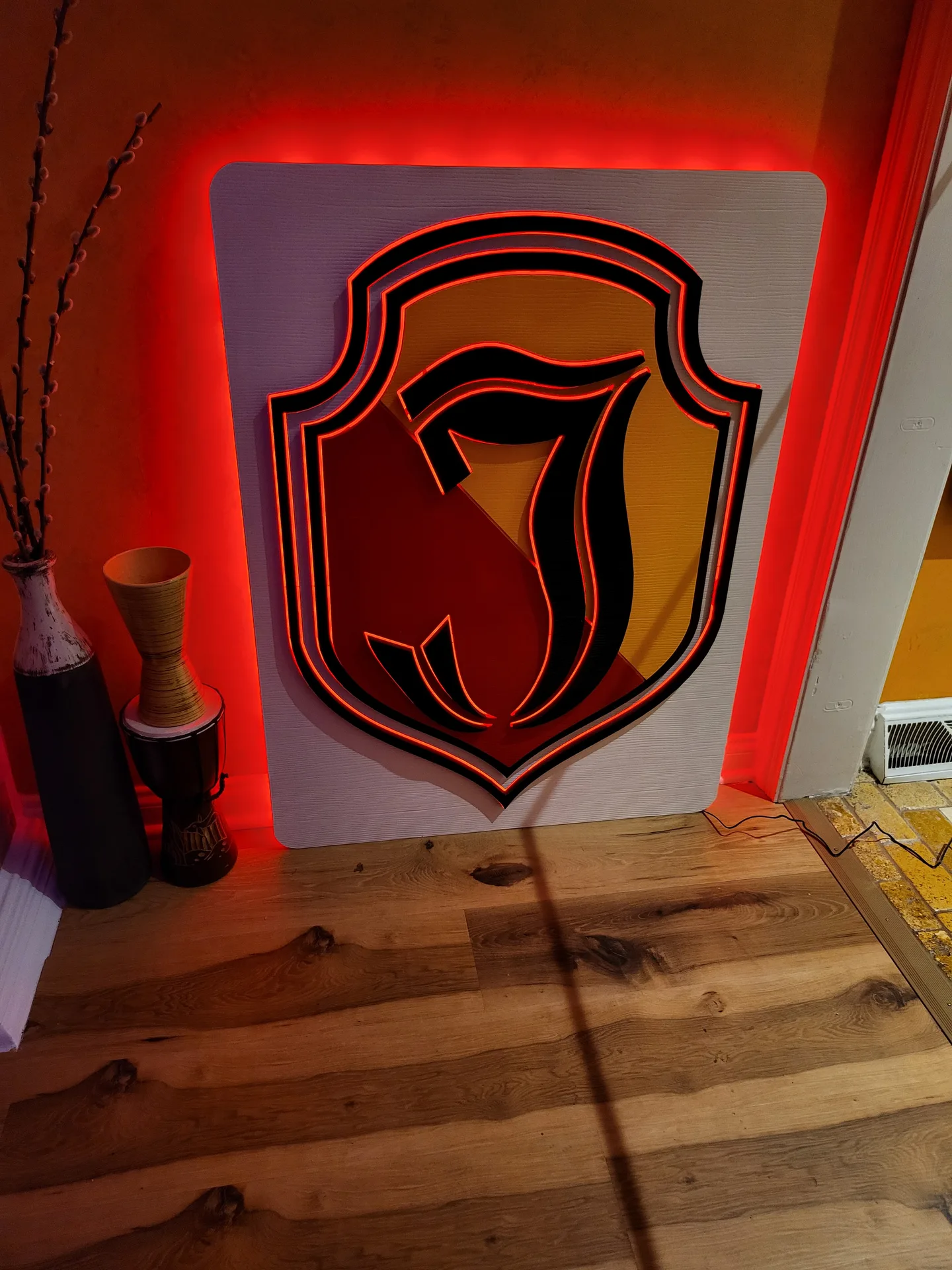 Backlit emblem shield crest red