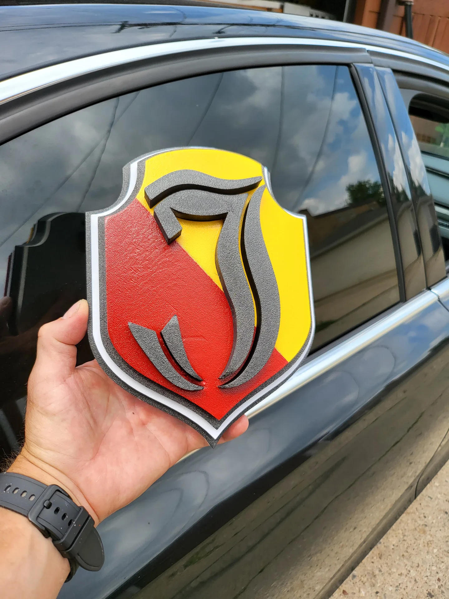 Layered emblem scorpion crest daylight